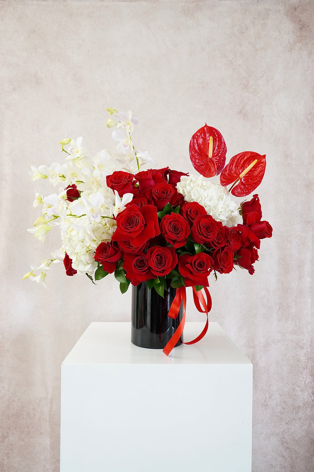Love Deluxe (100 rosas con Orquídeas)